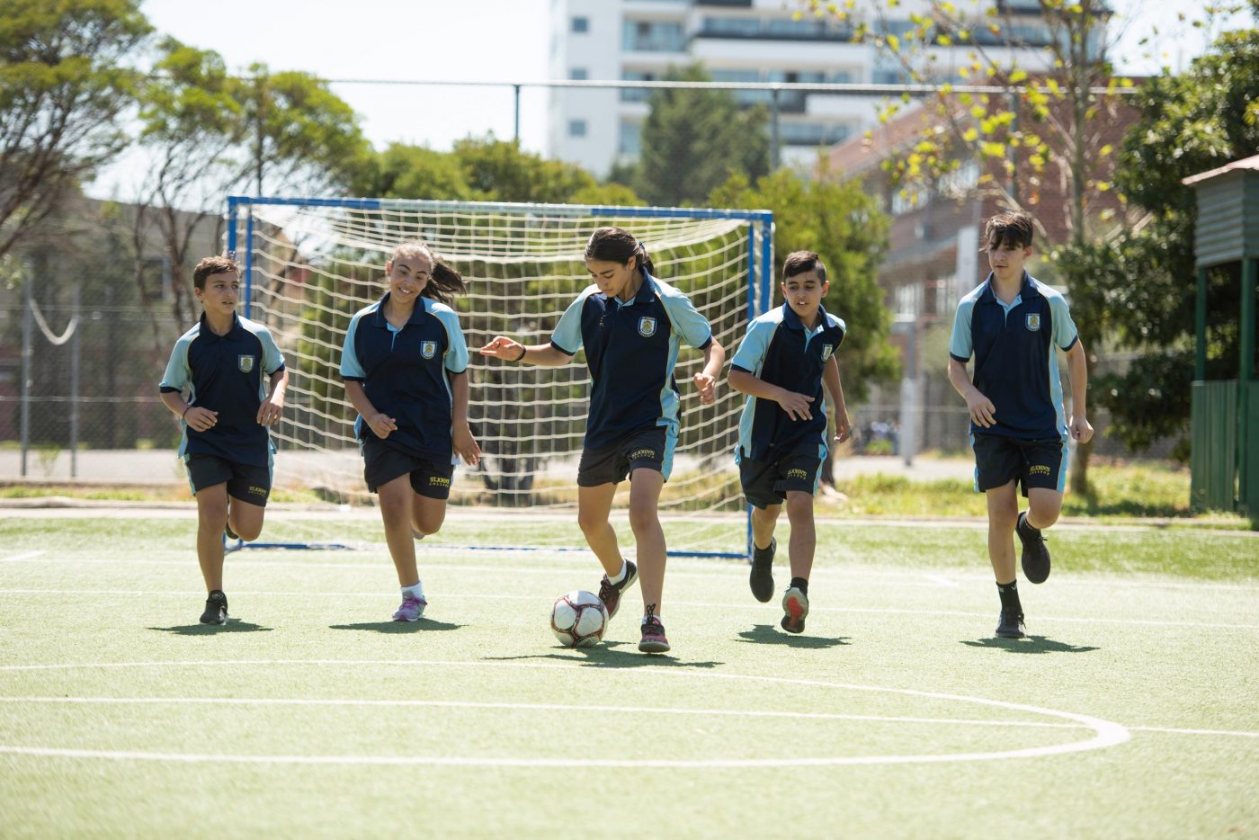 students playing soccer