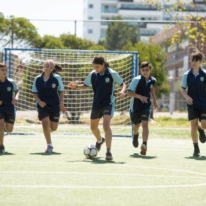students playing soccer